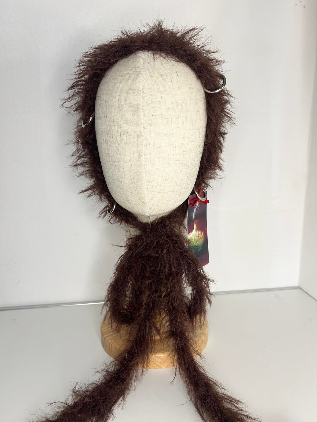 (ONE OF A KIND) BROWN PIERCING BONNET