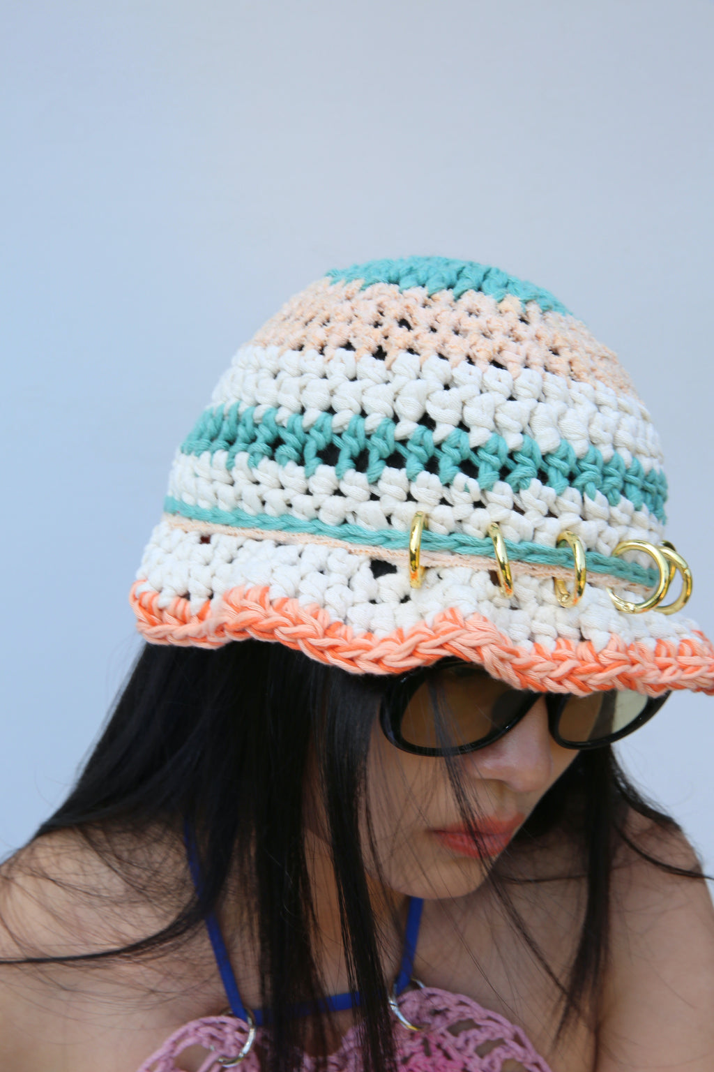 ORANGE, TURQUOISE & WHITE CROCHET PIERCING HAT